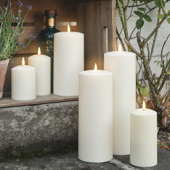 Six outdoor LED candles in different sizes