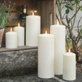 Six outdoor LED candles in different sizes