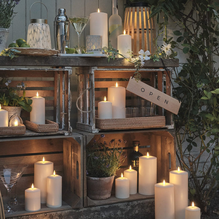 Garden shelves with LED candles and lanterns