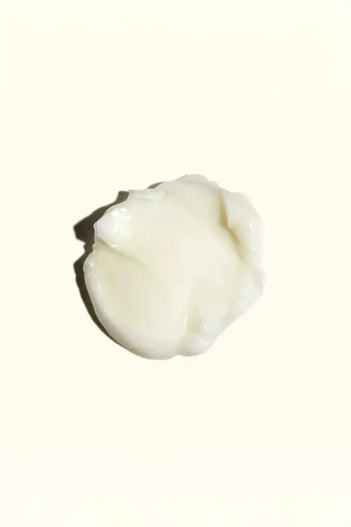Close-up of the rich, creamy texture swatch of the Amika Soulfood Nourishing Mask.