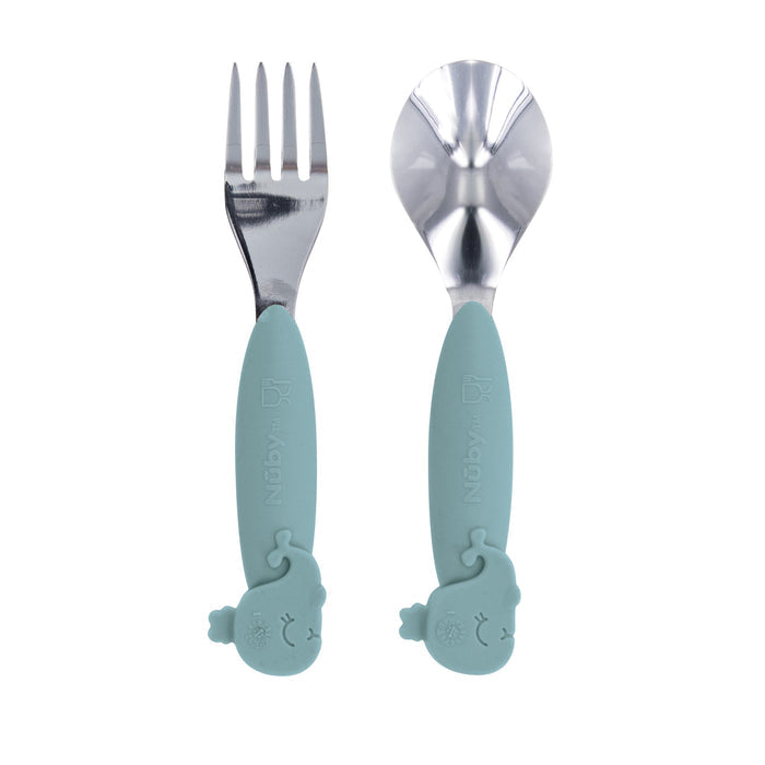 The Animal Friends 6-Piece Dinnerware Set - Blue Whale includes self-feeding utensils with teal handles, embossed animal faces, and small ears, making mealtime playful and kid-friendly for your baby.
