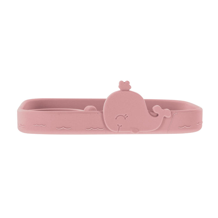 The Animal Friends All Silicone Tray is a pink food tray with a smiling embossed whale in the center and wave patterns on the sides, perfect as a baby plate for toddler feeding.