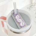 Lilac shell-shaped tumbler topper from Coconut Lane, designed to fit over a straw and lid.