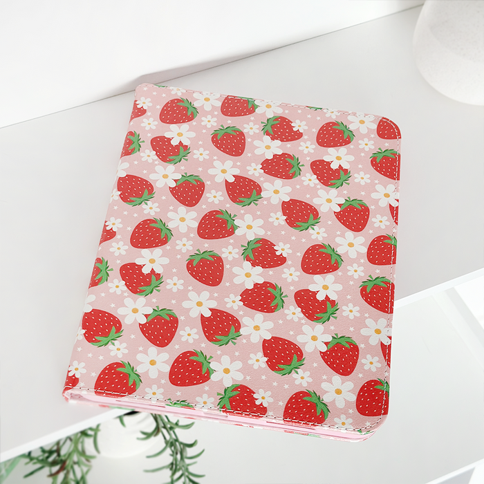Strawberry-patterned iPad case with floral accents in pink and red, featuring a smooth finish by Coconut Lane.