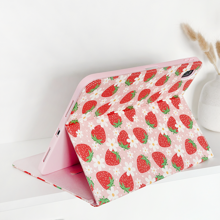 Pink iPad case with a strawberry and daisy pattern from Coconut Lane.