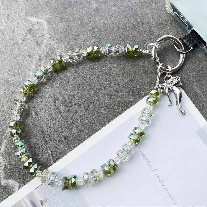 Bow & Bling Fancy Phone Charm â Bow & Bling Phone Charm - Iridescent & Emerald Beaded Phone Wrist Strap Put a bow on it and make it sparkle!