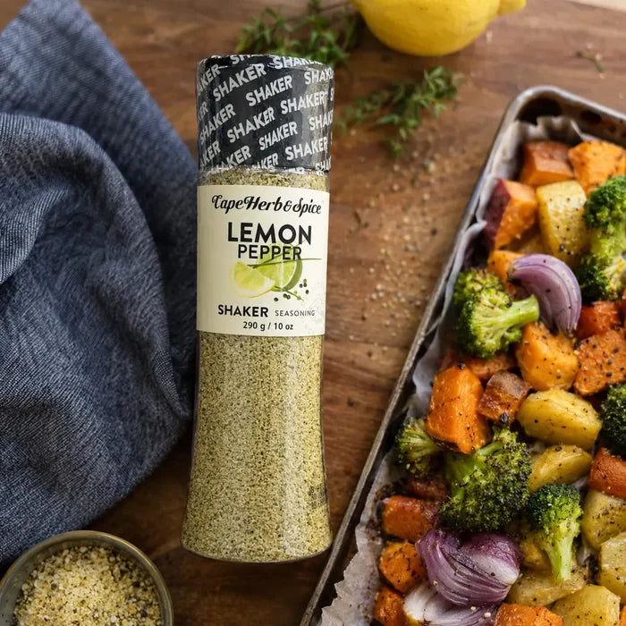 Cape Herb & Spice Lemon Pepper Shaker 290g beside roasted vegetables in a food preparation scene