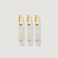 Three Creed Carmina 10ml Eau de Parfum atomiser refill vials with gold caps - Flat Lay | Creed Fragrances