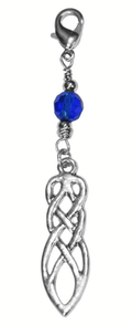 silver celtic knot charm with blue faceted bead and lobster clasp