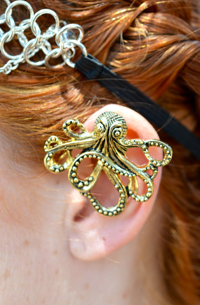 Cthulhu gold elf ear cuff worn on ear, lightweight no-piercing fantasy jewelry side view
