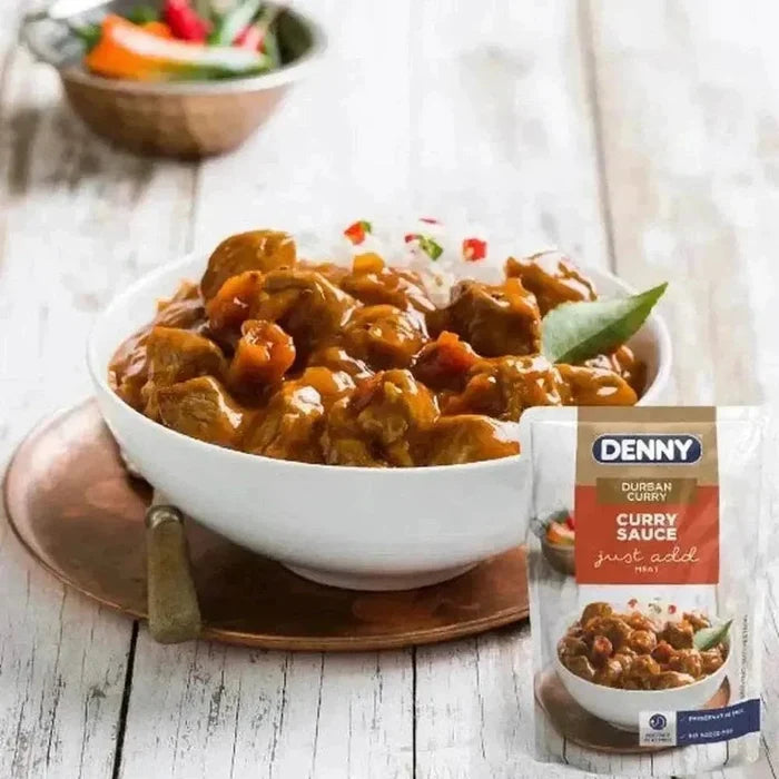 Denny Curry Sauce Durban Curry 415g jar with spices, tomatoes, onions, and garlic for authentic Durban Curry