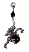 silver dragon charm holding black bead with lobster clasp