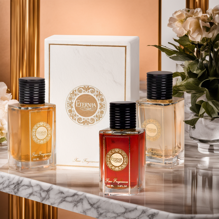 Eternia Eau de Parfum set with gold-logo box and four glass bottles