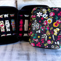 Fancy Floral Print Fancy Band Storage Case — Case made of PU leather, Nylon, Multi spandex, Lycra Dimensions are W 7 3/4" X L 8 1/2" X H 4 1/2" This item is storage case only bands not included.