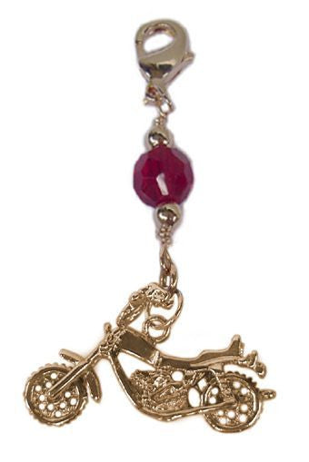 Gold motorcycle hair charm with red bead, front view