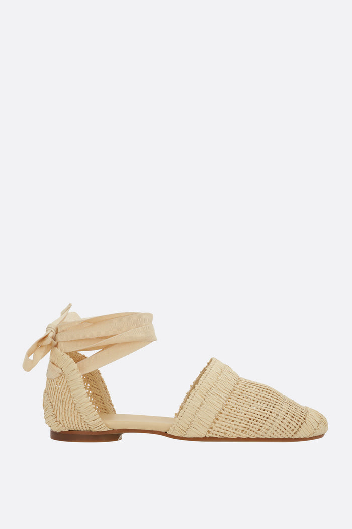 Goldie flat sandals in raffia