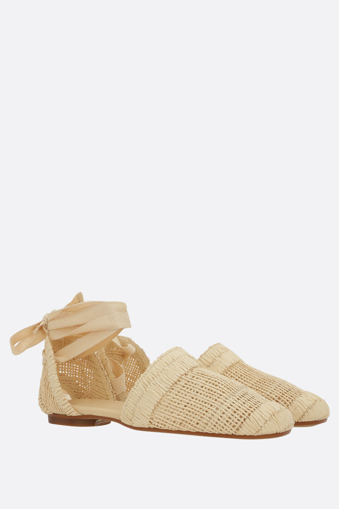 Goldie flat sandals in raffia