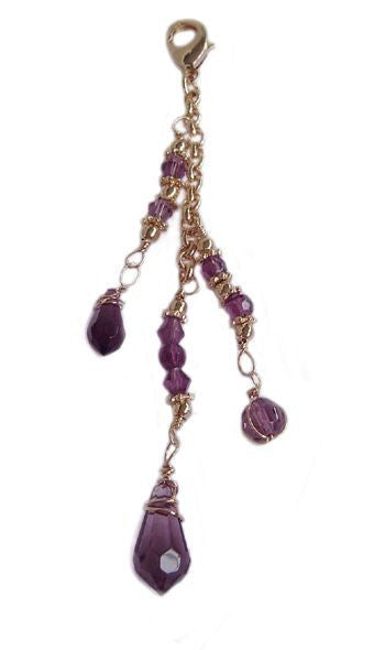 Large gold 3-strand hair charm with purple beads and lobster clasp