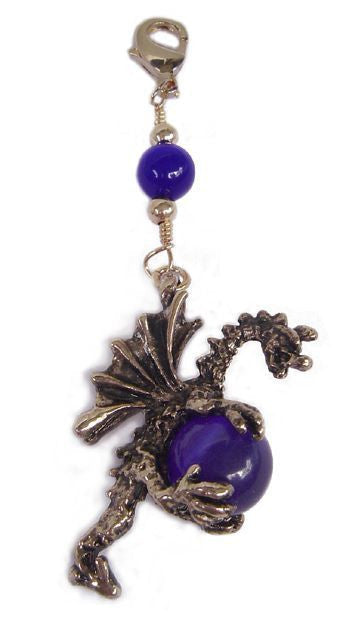 Large gold dragon charm holding blue glass bead, front view – add-on hair accessory