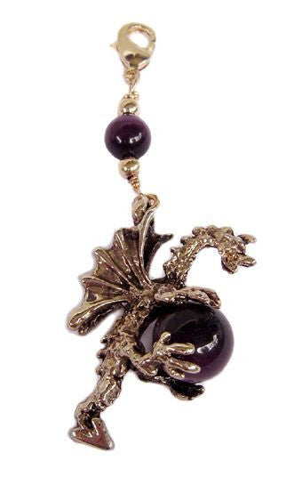 Large gold dragon charm holding purple glass bead, front view – add-on hair accessory