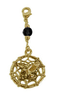gold dreamcatcher charm with eagle center and black faceted bead mini hair accessory front view