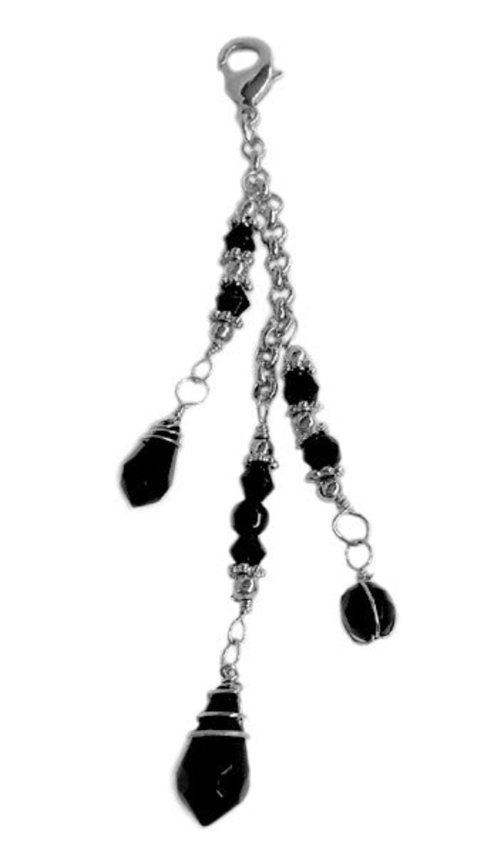 silver multi-strand charm with black faceted beads and lobster clasp