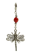 silver dragonfly charm with red faceted glass bead and lobster clasp