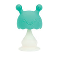 The Nuby Mushroom Bobble Head Teether Toy is a teal and white silicone teether shaped like a smiling mushroom with two round antennae and a wide base, perfect for soothing baby's sore gums.