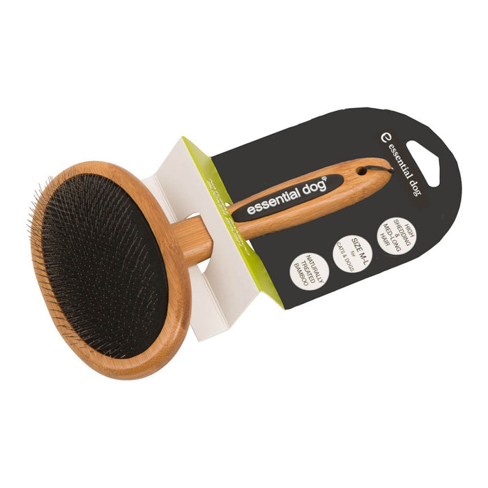 Pet grooming brush with wooden handle and black bristles, displayed with packaging on a white background.