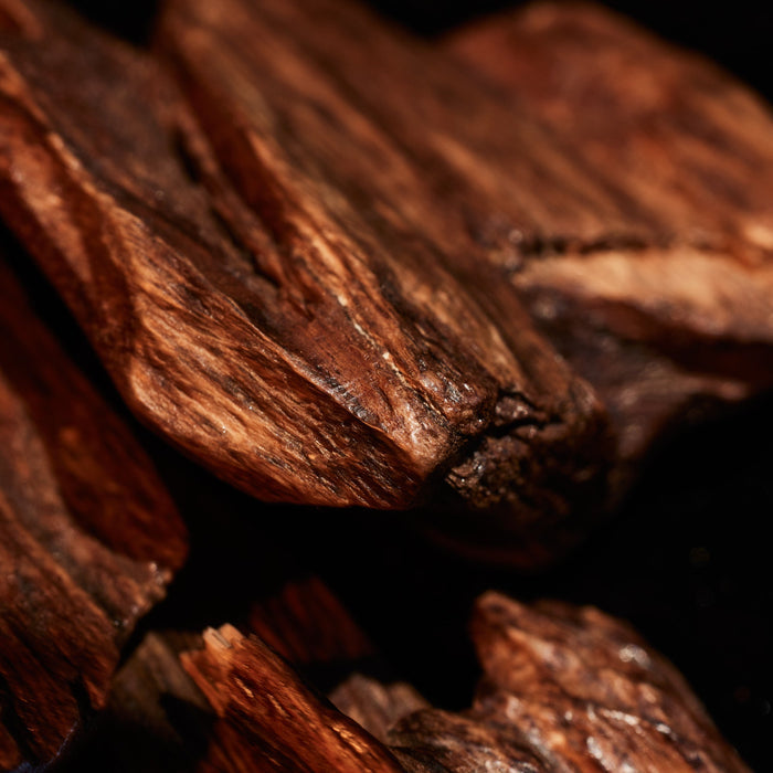 Close-up of dark brown wood texture