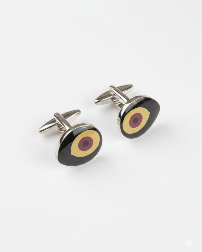 Silver-tone round cufflinks with black enamel target pattern and bar back closures