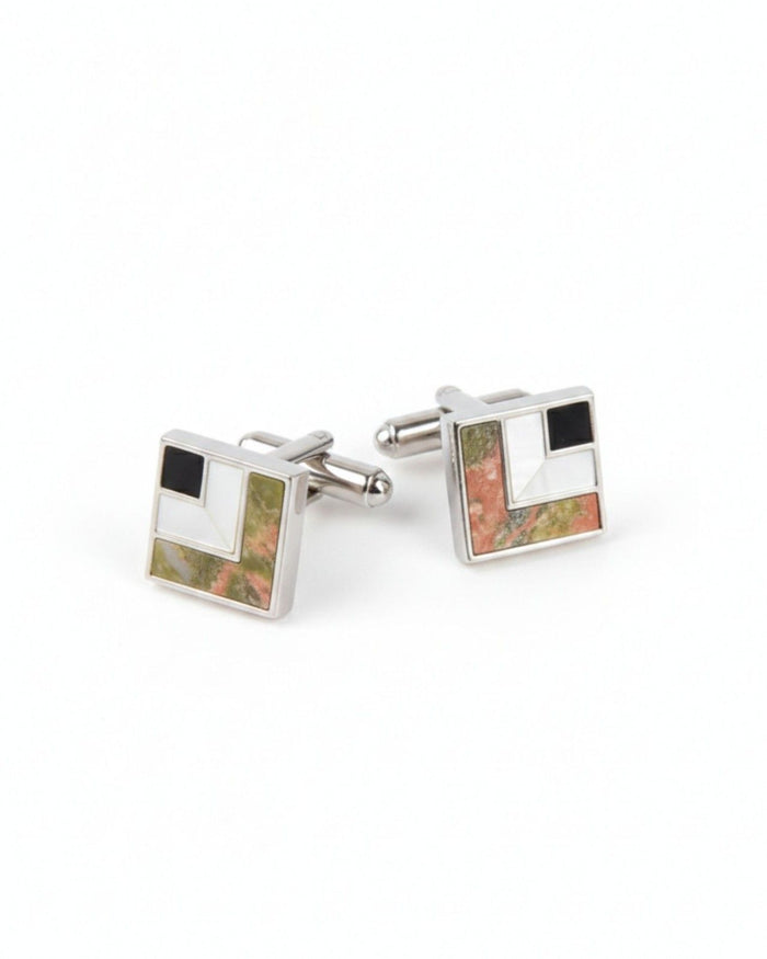 Square silver cufflinks with black enamel and multicolor abstract stone inlay.