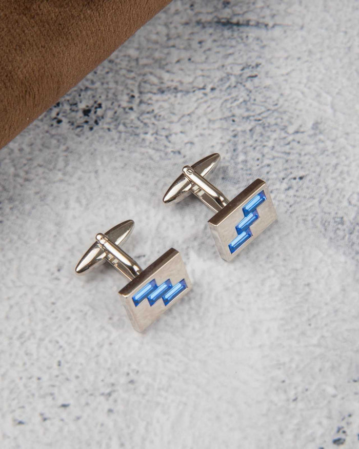 Men's square cufflinks, silver-tone with blue geometric crystal inlay, angled view