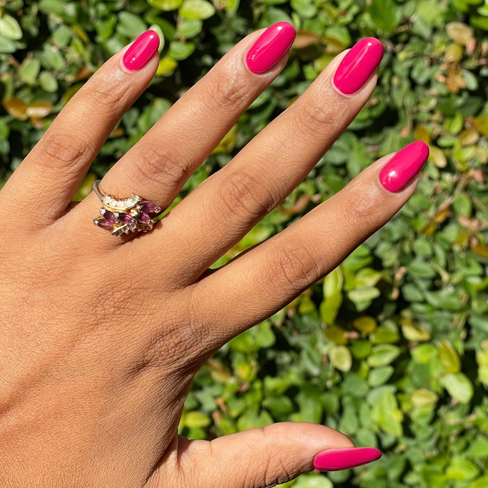JG - Gel on almond-shaped nails in a vibrant rich berry shade for a striking and durable manicure by Olive and June