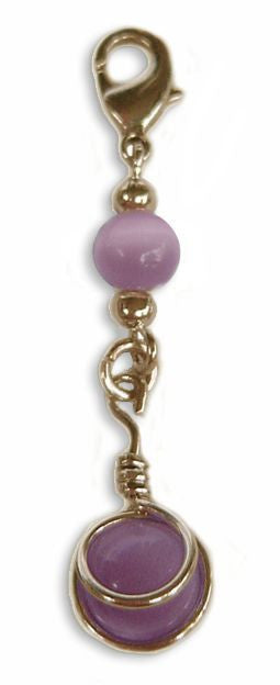 Pink bead hair charm with gold metal wrap and clasp for braids and Hair Twisters on white background