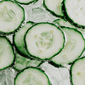 Close-up of sliced cucumbers in a water bath