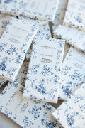 Individually wrapped chocolate bars from the Tuck Shop x Maman collection with blue floral packaging.